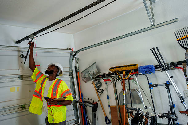 Professional Garage Door Panel Replacement technician working in Bellerose, NY